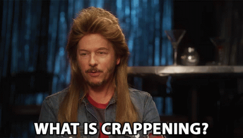 A Man With A Mullet Says What Is Crapping GIF