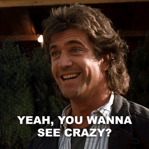 A Man With A Mullet Smiles And Says " Yeah You Wanna See Crazy " GIF