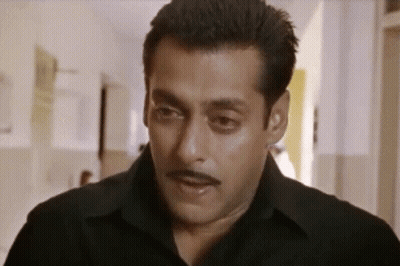 A Man With A Mustache And A Black Shirt GIF