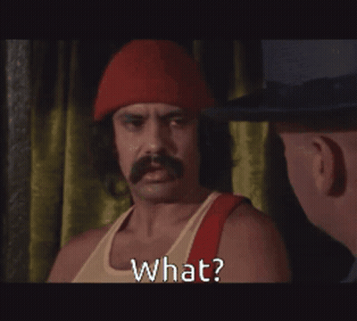 A Man With A Mustache And A Red Hat Says What GIF