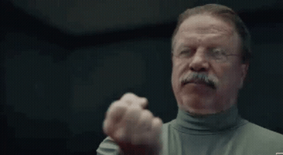 A Man With A Mustache And Glasses Is Giving A Thumbs Up . GIF