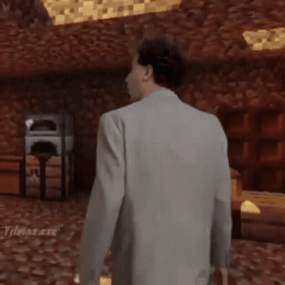A Man With A Mustache And Tie Says King In The GIF
