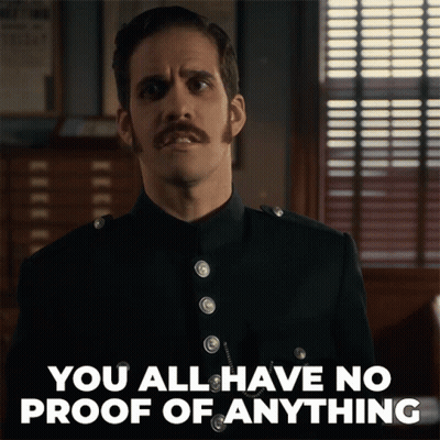 A Man With A Mustache Has The Words You All Have No Proof Of Anything Above Him GIF