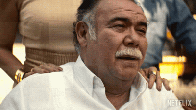 A Man With A Mustache Is Being Comforted By A Woman With A Netflix Logo On The Bottom GIF