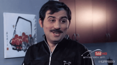 A Man With A Mustache Is In Front Of A Sign That Says Youtube Hd GIF