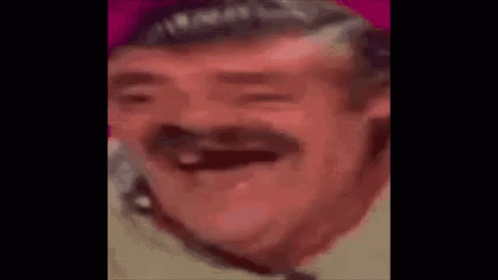 A Man With A Mustache Is Laughing With His Eyes Closed . GIF