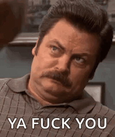 A Man With A Mustache Is Making A Face And Says `` Ya Fuck You '' . GIF
