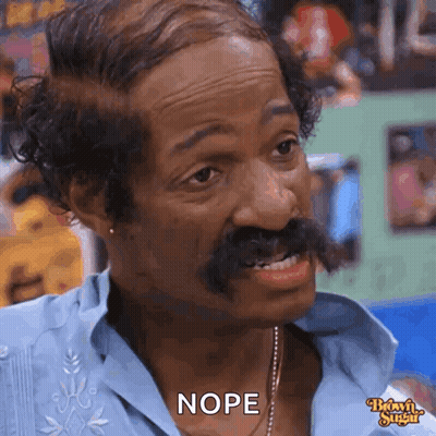 A Man With A Mustache Is Making A Funny Face And Saying Nope GIF