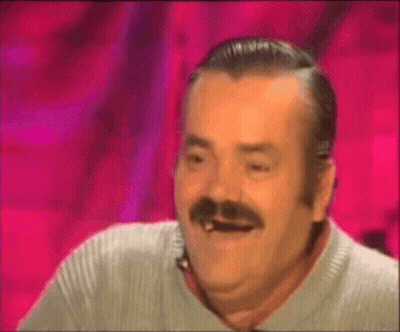 A Man With A Mustache Is Making A Funny Face With His Mouth Open . GIF