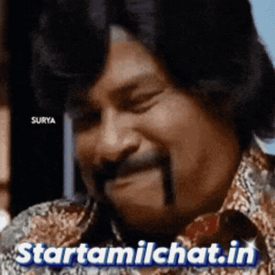 A Man With A Mustache Is Making A Funny Face With The Words Starttamilchat.in Below Him . GIF