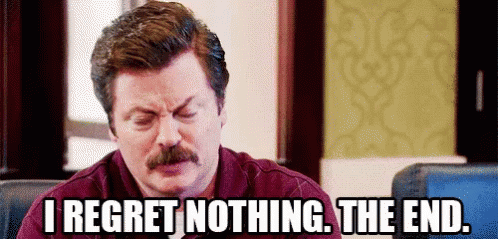 A Man With A Mustache Is Sitting At A Table And Says `` I Regret Nothing , The End . '' GIF