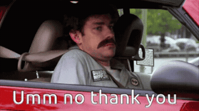 A Man With A Mustache Is Sitting In A Car With The Words Umm No Thank You On The Side GIF