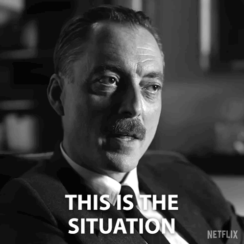 A Man With A Mustache Is Sitting In A Chair And Says " This Is The Situation " GIF