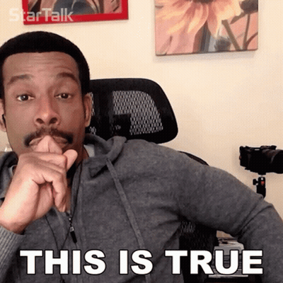 A Man With A Mustache Is Sitting In A Chair With His Hand On His Chin And The Words This Is True Above Him GIF