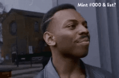 A Man With A Mustache Is Smiling With The Words Mint # 000 & List Below Him GIF