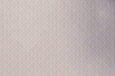 A Man With A Mustache Is Standing In A Bathtub With Smoke Coming Out Of His Nose . GIF