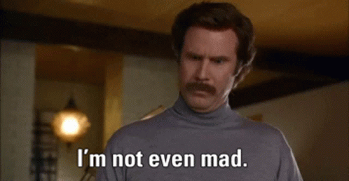 A Man With A Mustache Is Standing In A Room And Saying `` That 'S Amazing . '' GIF