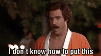 A Man With A Mustache Is Standing In Front Of A Fire And Says `` I Don T Know How To Put This '' . GIF