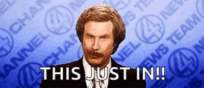 A Man With A Mustache Is Standing In Front Of A News Team And Says This Just In GIF