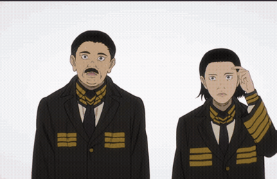 A Man With A Mustache Is Standing Next To A Woman In A Black Suit GIF