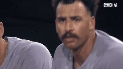 A Man With A Mustache Is Sweating While Wearing A Shirt That Says Yes GIF