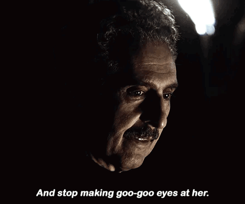 A Man With A Mustache Is Talking About Making Goo-Goo Eyes At Her GIF