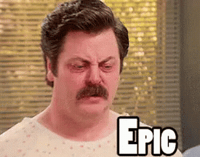 A Man With A Mustache Is Wearing A Hospital Gown And The Word Epic Is On His Chest . GIF
