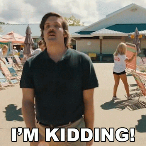 A Man With A Mustache Says I 'M Kidding While Standing In Front Of A Pool GIF