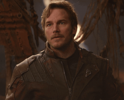 A Man With A Mustache Wearing A Leather Jacket With A Zipper GIF