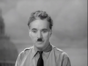 A Man With A Mustache Wearing A Shirt And Tie GIF