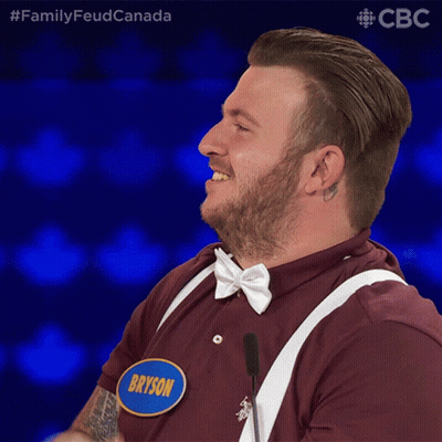 A Man With A Name Tag That Says Bryson Is Laughing GIF