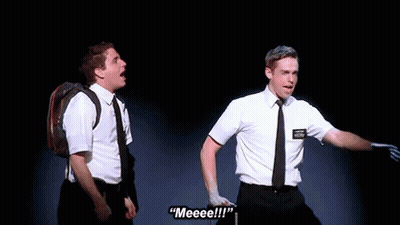 A Man With A Name Tag That Says " Meeeee " GIF