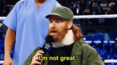A Man With A Neck Brace Is Talking Into A Microphone And Says I 'M Not Great GIF