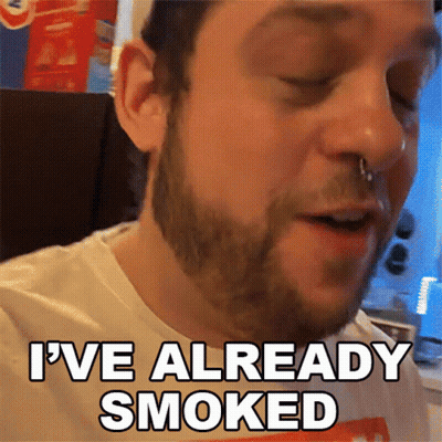 A Man With A Nose Ring Is Smoking A Cigarette And Says I 'Ve Already Smoked GIF