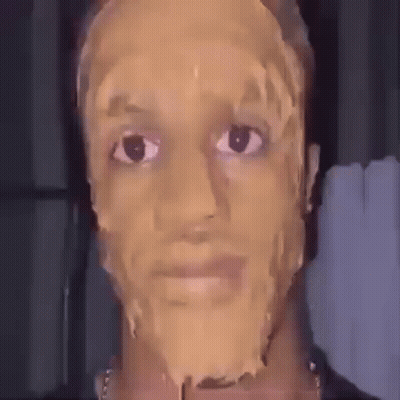 A Man With A Peanut Butter Mask On His Face . GIF