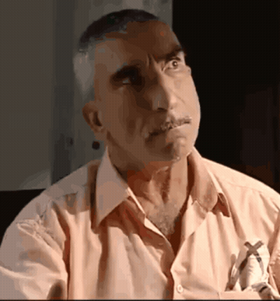 A Man With A Pen In His Pocket Is Looking Up GIF
