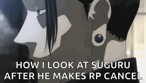 A Man With A Piercing In His Ear Is Looking At Someone . GIF