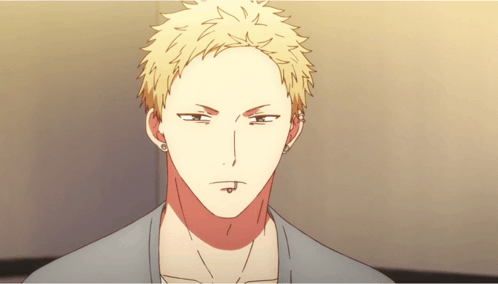 A Man With A Piercing In His Lip Looks Angry GIF