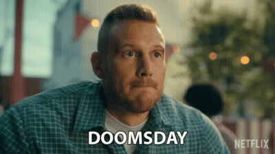A Man With A Plaid Shirt Says Doomsday GIF