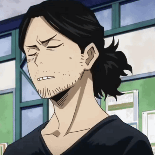 A Man With A Ponytail And A Beard Is Making A Face GIF
