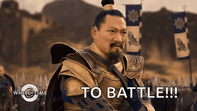 A Man With A Ponytail And A Beard Says To Battle GIF