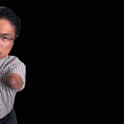 A Man With A Prosthetic Arm Is Pointing At The Camera With The Words I 'M Watching You Above Him GIF