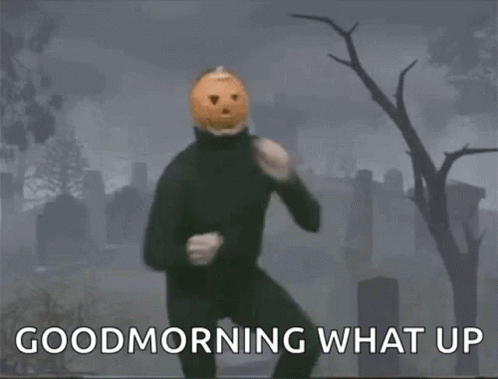 A Man With A Pumpkin On His Head Is Dancing In A Cemetery And Says Good Morning What Up GIF