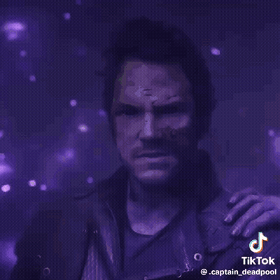 A Man With A Purple Background And The Words Guns Of The Galaxy On It GIF