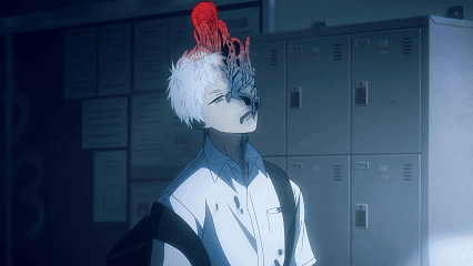 A Man With A Red Flower On His Head Is Standing In Front Of Lockers GIF