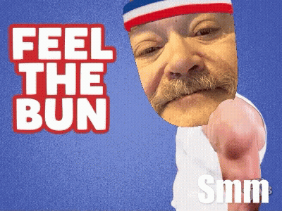 A Man With A Red White And Blue Headband Says Feel The Bun Smm GIF
