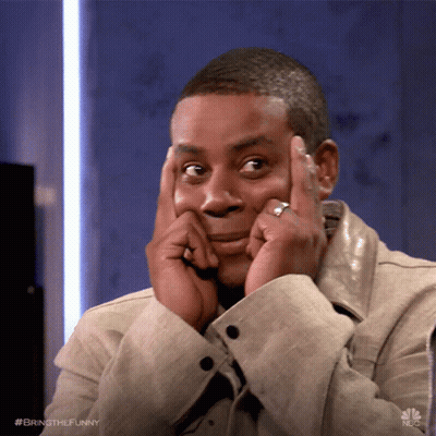 A Man With A Ring On His Finger Holds His Hands To His Face GIF