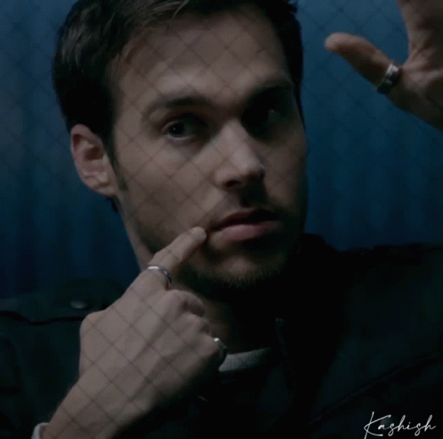A Man With A Ring On His Finger Is Behind A Fence With The Name Kashish Written On The Bottom GIF