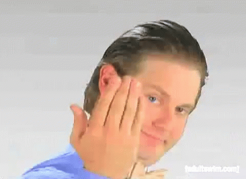 A Man With A Ring On His Finger Is Making A Funny Face GIF