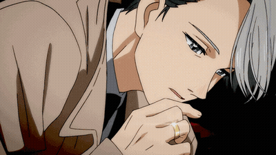 A Man With A Ring On His Finger Looks Down GIF